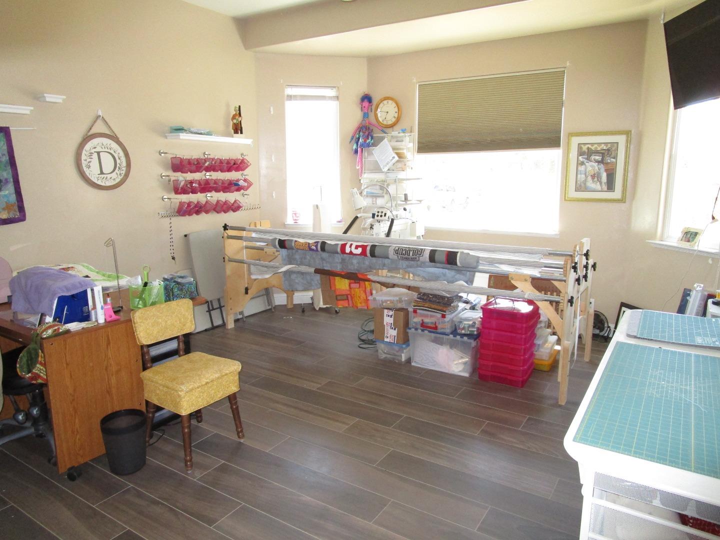 1320 Spring Grove Road Hollister, CA 95023 - Photo 21 of 51 a living room with furniture and a table