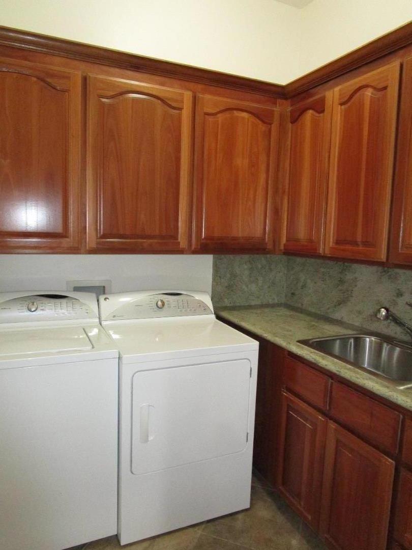 1320 Spring Grove Road Hollister, CA 95023 - Photo 34 of 51 a utility room with dryer and washer