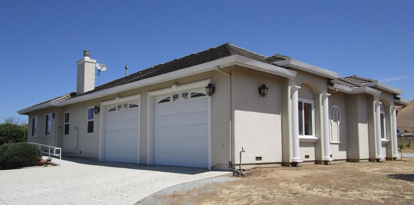1320 Spring Grove Road Hollister, CA 95023 - Photo 38 of 51 a front view of a house with a garage