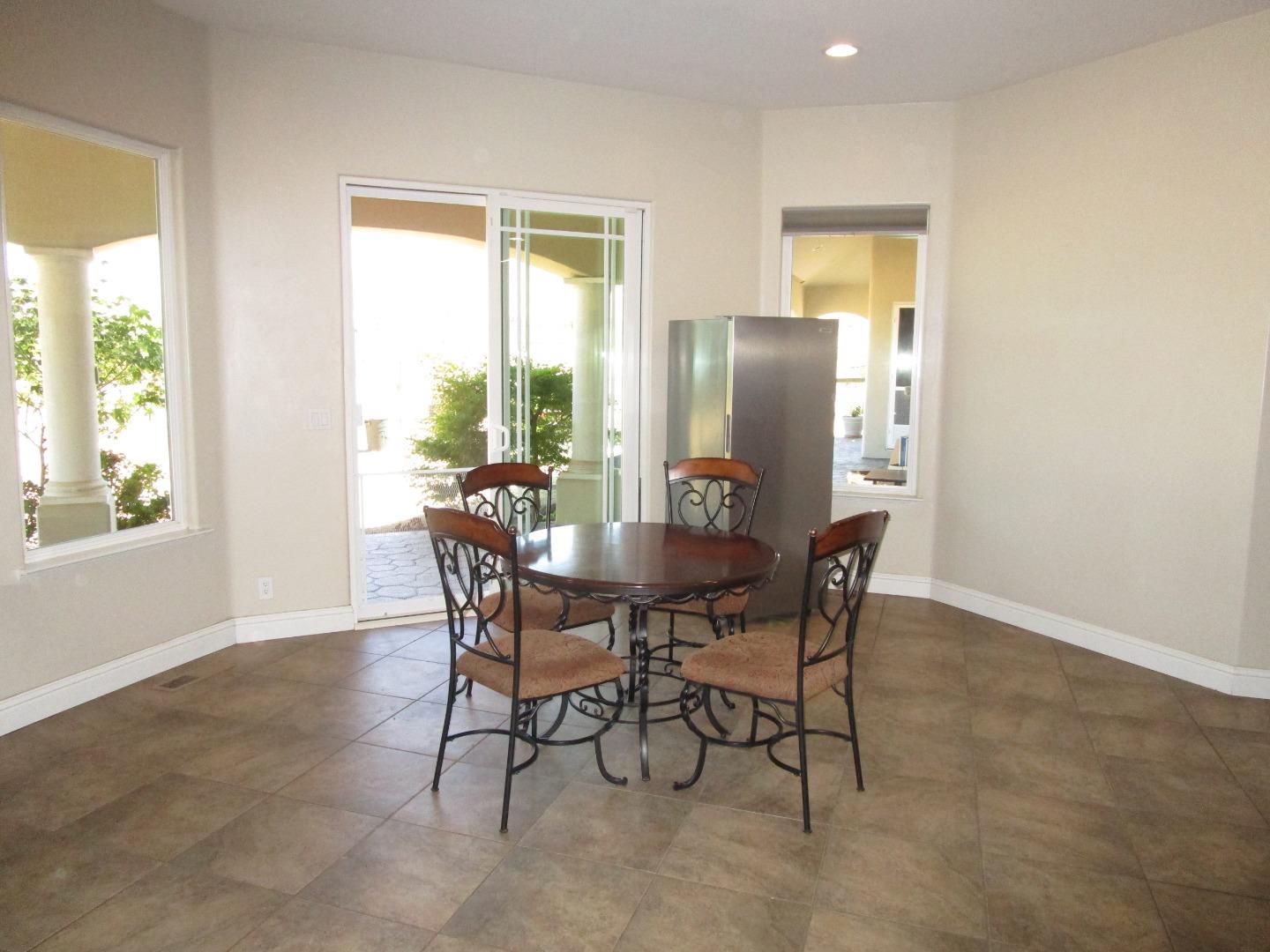 1320 Spring Grove Road Hollister, CA 95023 - Photo 6 of 51 a view of a dining room with furniture and a window