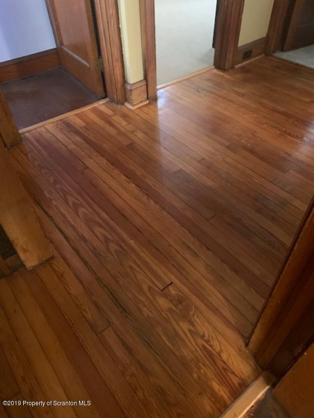 850 Main Street Duryea, PA 18642 - Photo 13 of 24 a view of an empty room with wooden floor