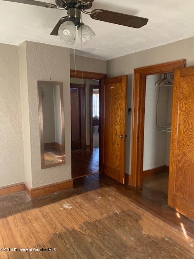 850 Main Street Duryea, PA 18642 - Photo 17 of 24 a view of an empty room with a ceiling fan