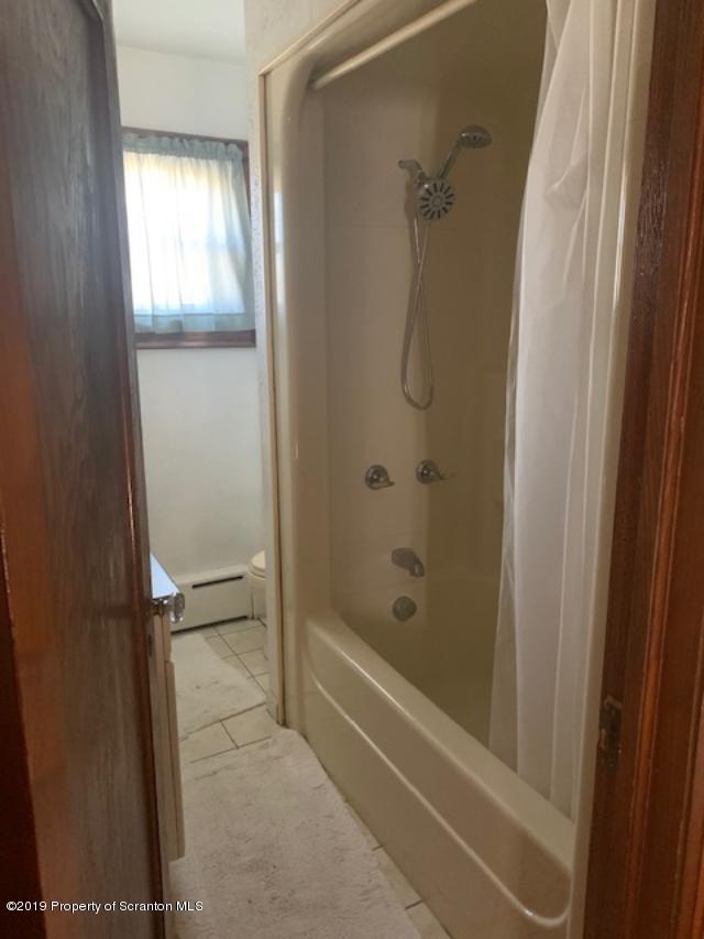 850 Main Street Duryea, PA 18642 - Photo 18 of 24 a bathroom with a bathtub