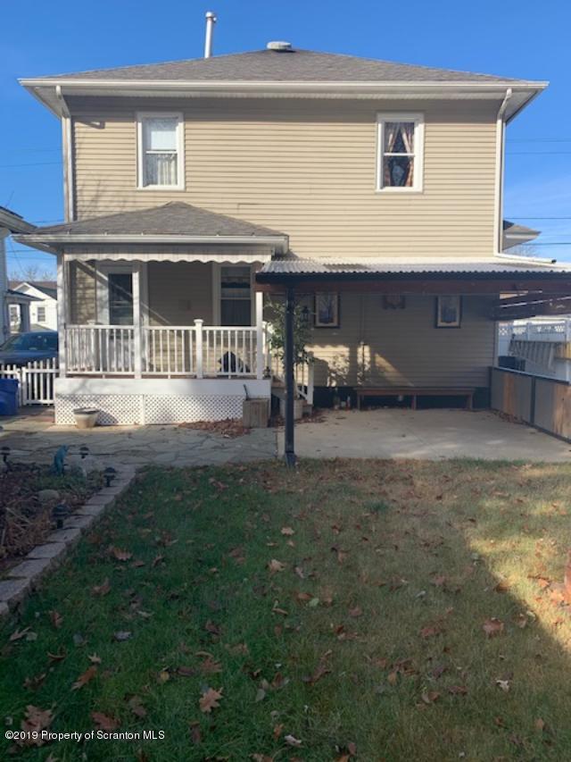 850 Main Street Duryea, PA 18642 - Photo 21 of 24 a front view of a house with a yard