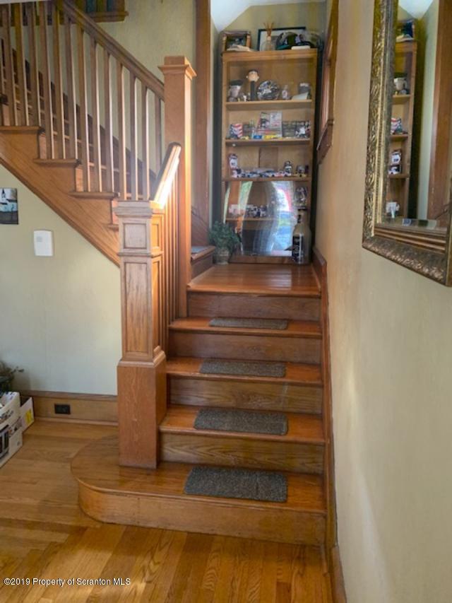 850 Main Street Duryea, PA 18642 - Photo 3 of 24 a view of entryway and hall with wooden floor