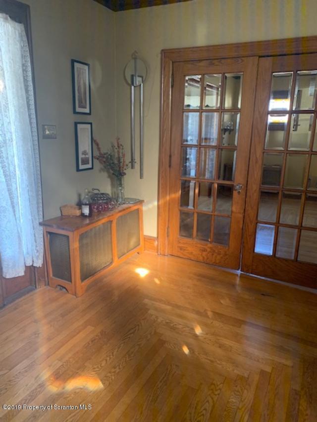 850 Main Street Duryea, PA 18642 - Photo 4 of 24 a living room with stainless steel appliances kitchen island granite countertop a refrigerator and a sink