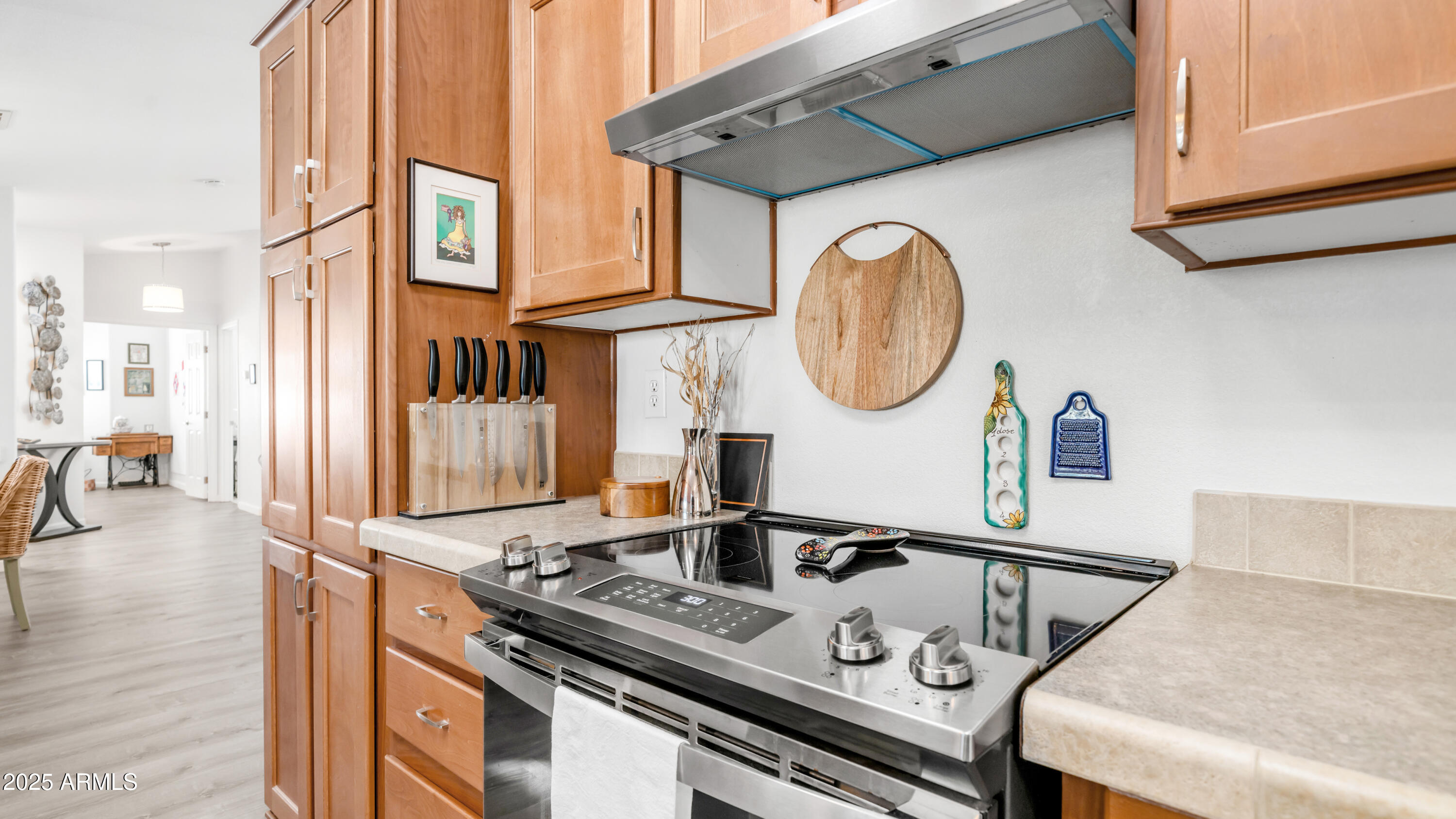2550 South Ellsworth Road, Unit 751 Mesa, AZ 85209 - Photo 8 of 27 a kitchen with stainless steel appliances granite countertop a stove and a sink