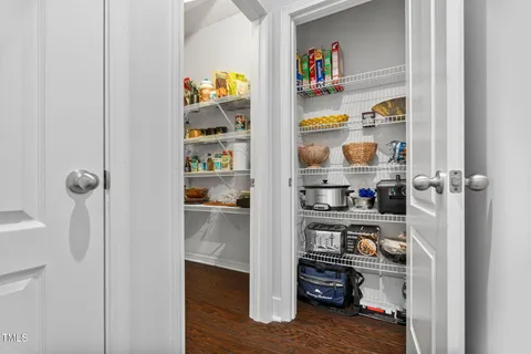 a bed room with a bed and a window