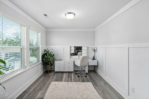 a bathroom with a shower curtain and a shower curtain