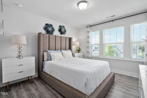 a view of a swimming pool with a yard