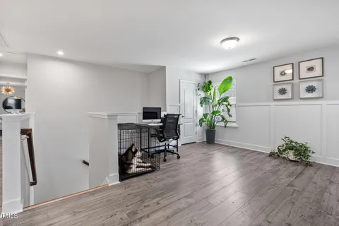 a view of a swimming pool with a lawn chairs