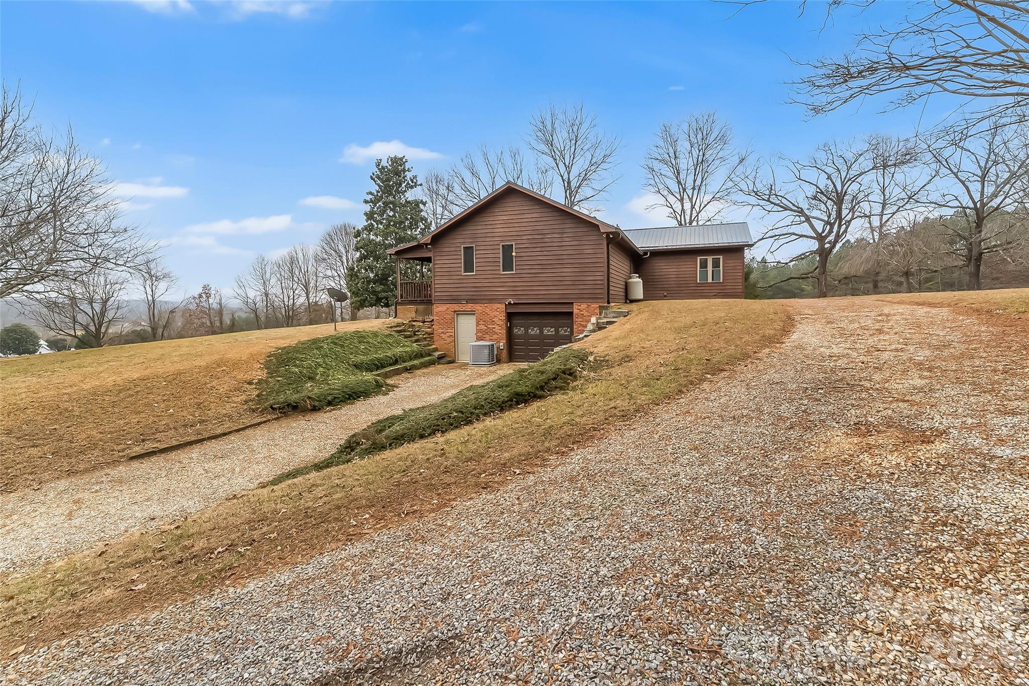 96 Patton Valley Drive Nebo, NC 28761 - Photo 9 of 29 a front view of a house with a yard and trees