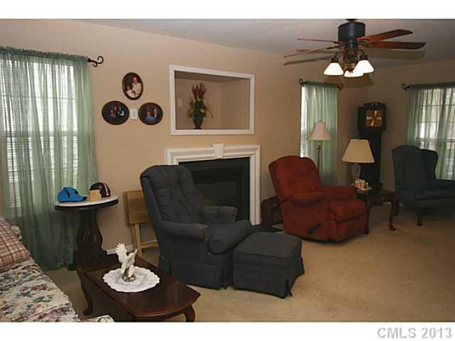 6526 Nevin Road Charlotte, NC 28262 - Photo 2 of 16 a living room with furniture and a large window