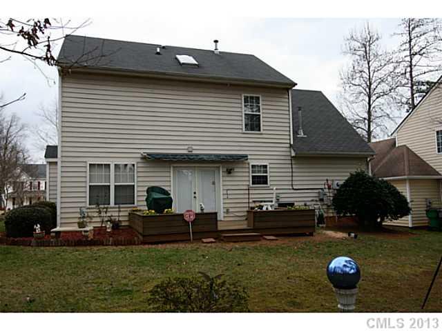 6526 Nevin Road Charlotte, NC 28262 - Photo 14 of 16 a view of a house with backyard