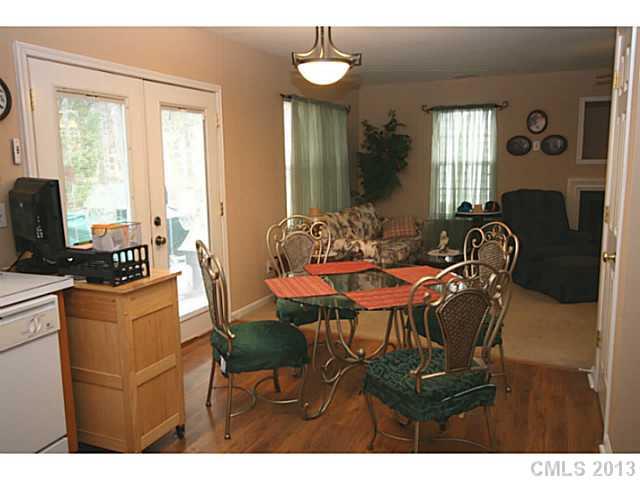6526 Nevin Road Charlotte, NC 28262 - Photo 5 of 16 a dining room with furniture and window