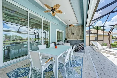 a view of a swimming pool with a patio