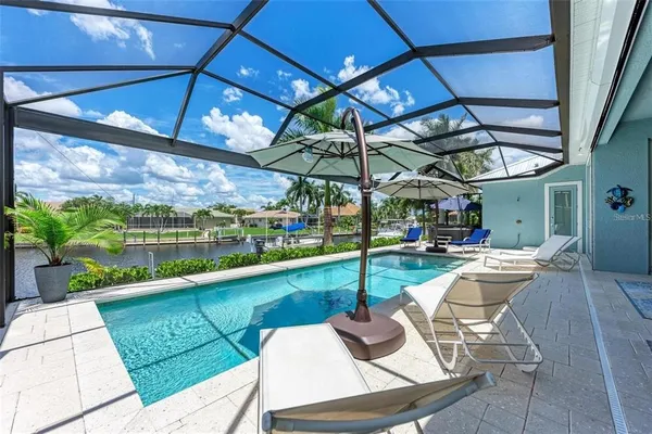 a table and chairs in a patio