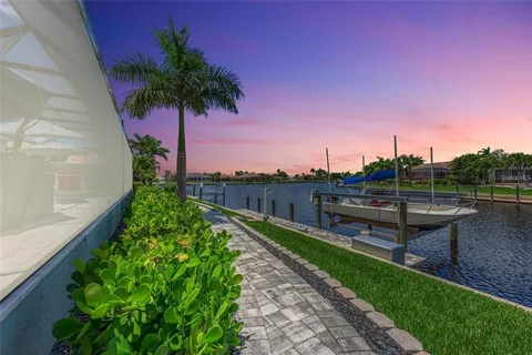 a view of a lake with a yard