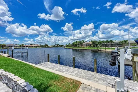 a view of a lake with a big yard