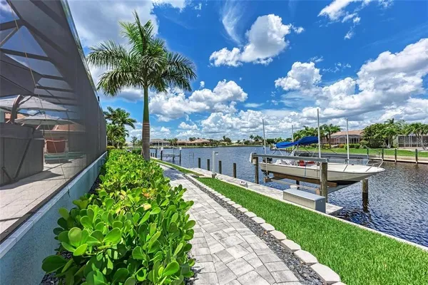 a view of a lake with a big yard