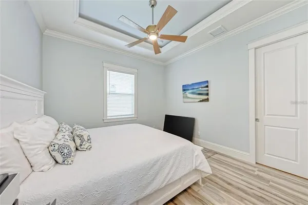 an aerial view of a city with lawn chairs