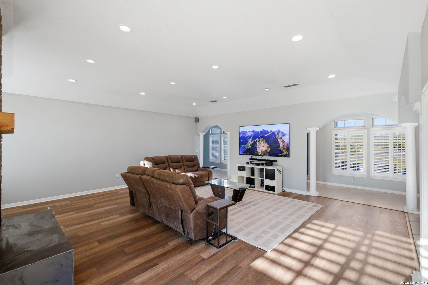 30870 Bridlegate Drive Bulverde, TX 78163 - Photo 12 of 44 a living room with furniture flat screen tv and wooden floor