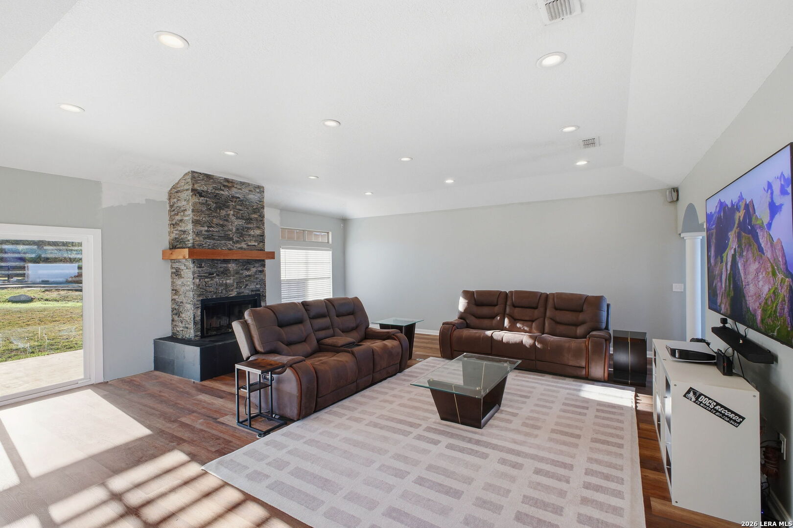 30870 Bridlegate Drive Bulverde, TX 78163 - Photo 13 of 44 a living room with furniture and a flat screen tv