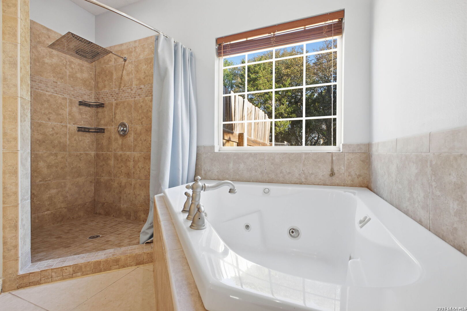30870 Bridlegate Drive Bulverde, TX 78163 - Photo 22 of 44 a white bath tub sitting next to a shower