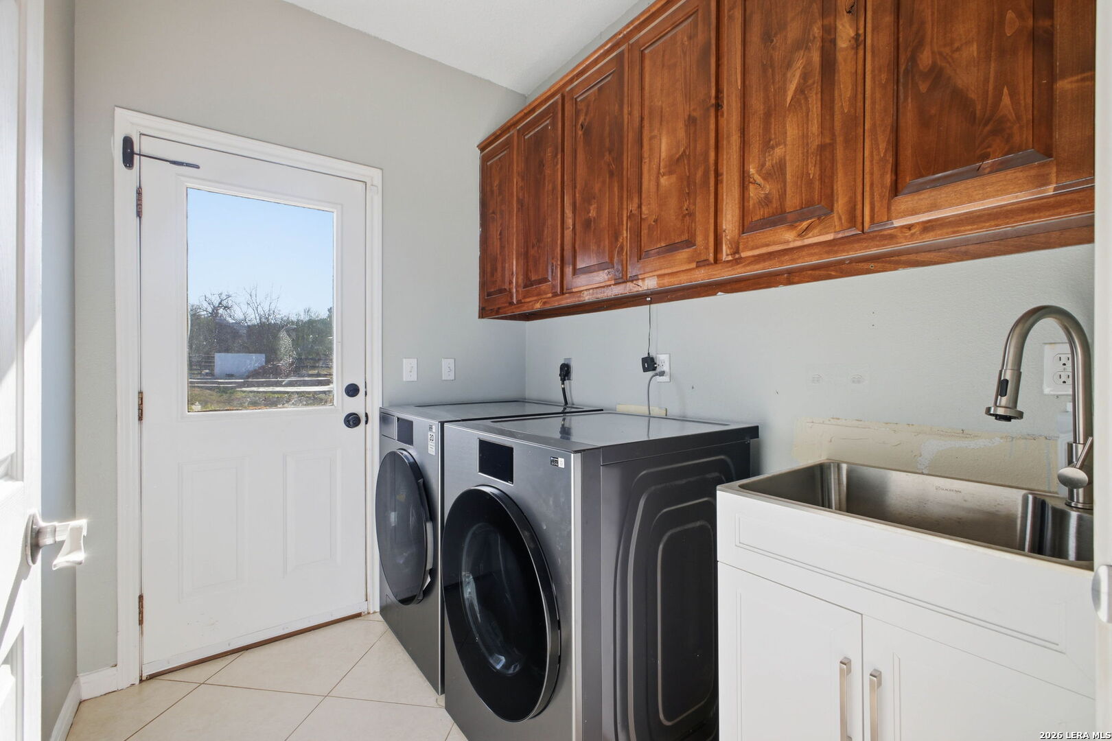 30870 Bridlegate Drive Bulverde, TX 78163 - Photo 26 of 44 a utility room with dryer and washer