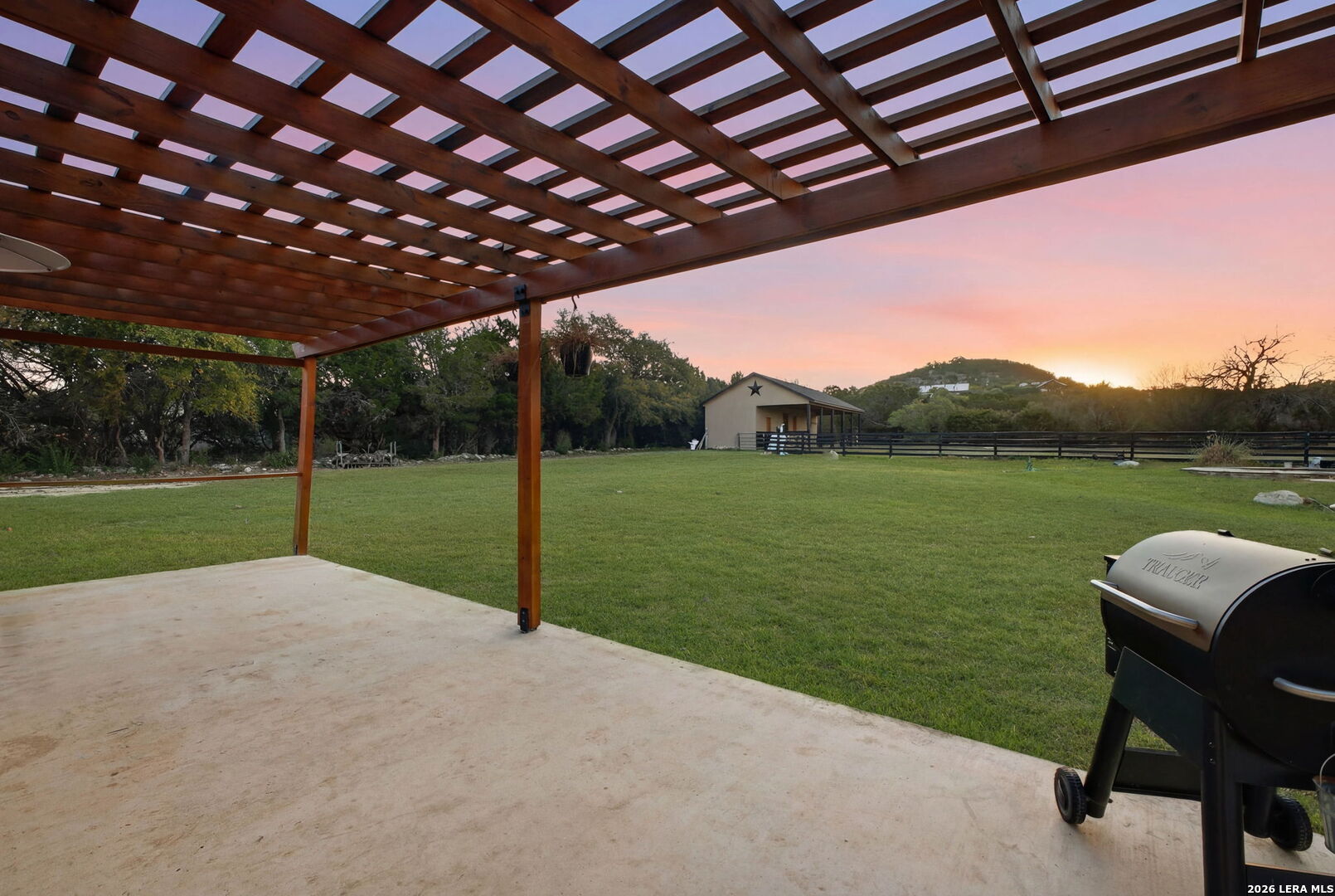 30870 Bridlegate Drive Bulverde, TX 78163 - Photo 28 of 44 a view of a backyard with sitting area