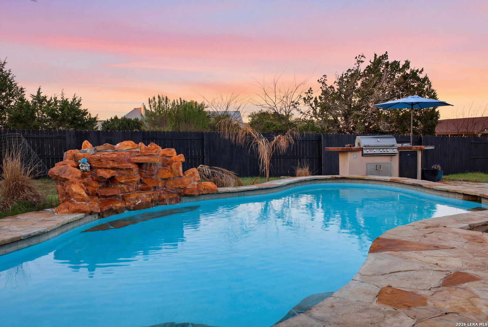 30870 Bridlegate Drive Bulverde, TX 78163 - Photo 29 of 44 a view of a swimming pool with a lounge chair