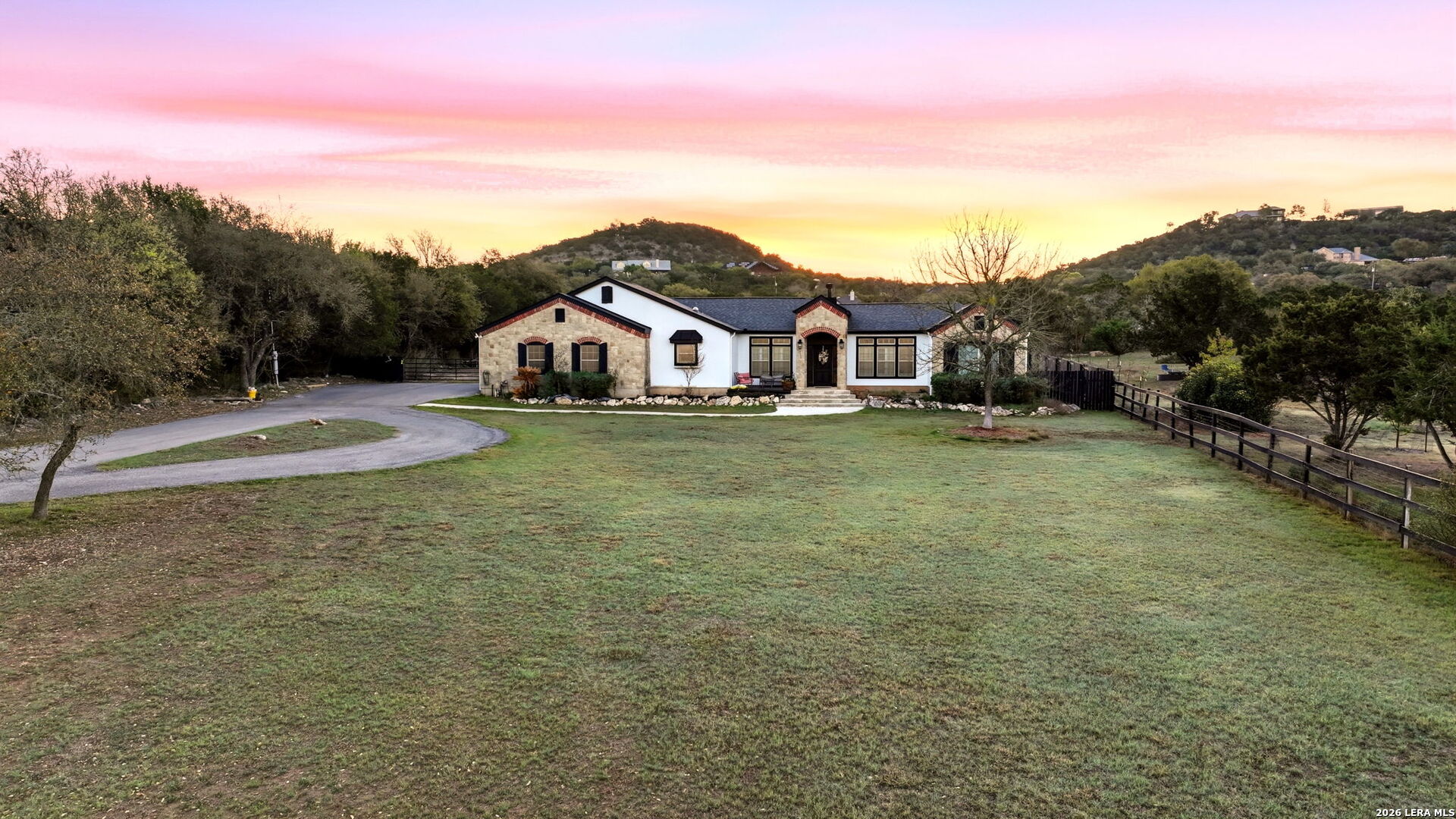 30870 Bridlegate Drive Bulverde, TX 78163 - Photo 34 of 44 a view of a house with a yard