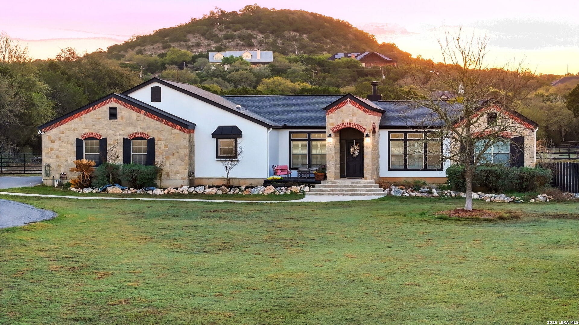 30870 Bridlegate Drive Bulverde, TX 78163 - Photo 36 of 44 a front view of a house with garden and porch