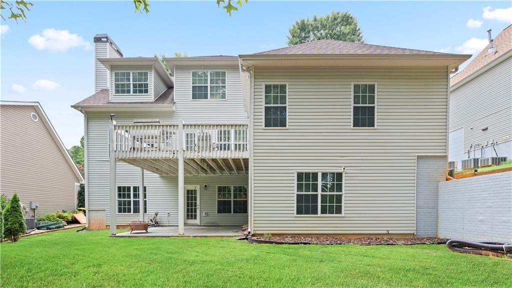 91 Medallion Park Newnan, GA 30265 - Photo 32 of 45 a front view of a house with a yard