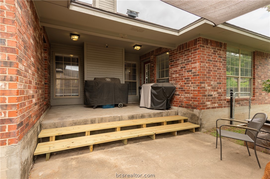 2009 Cobblestone Lane Bryan, TX 77807 - Photo 20 of 23 a backyard of a house with sofas