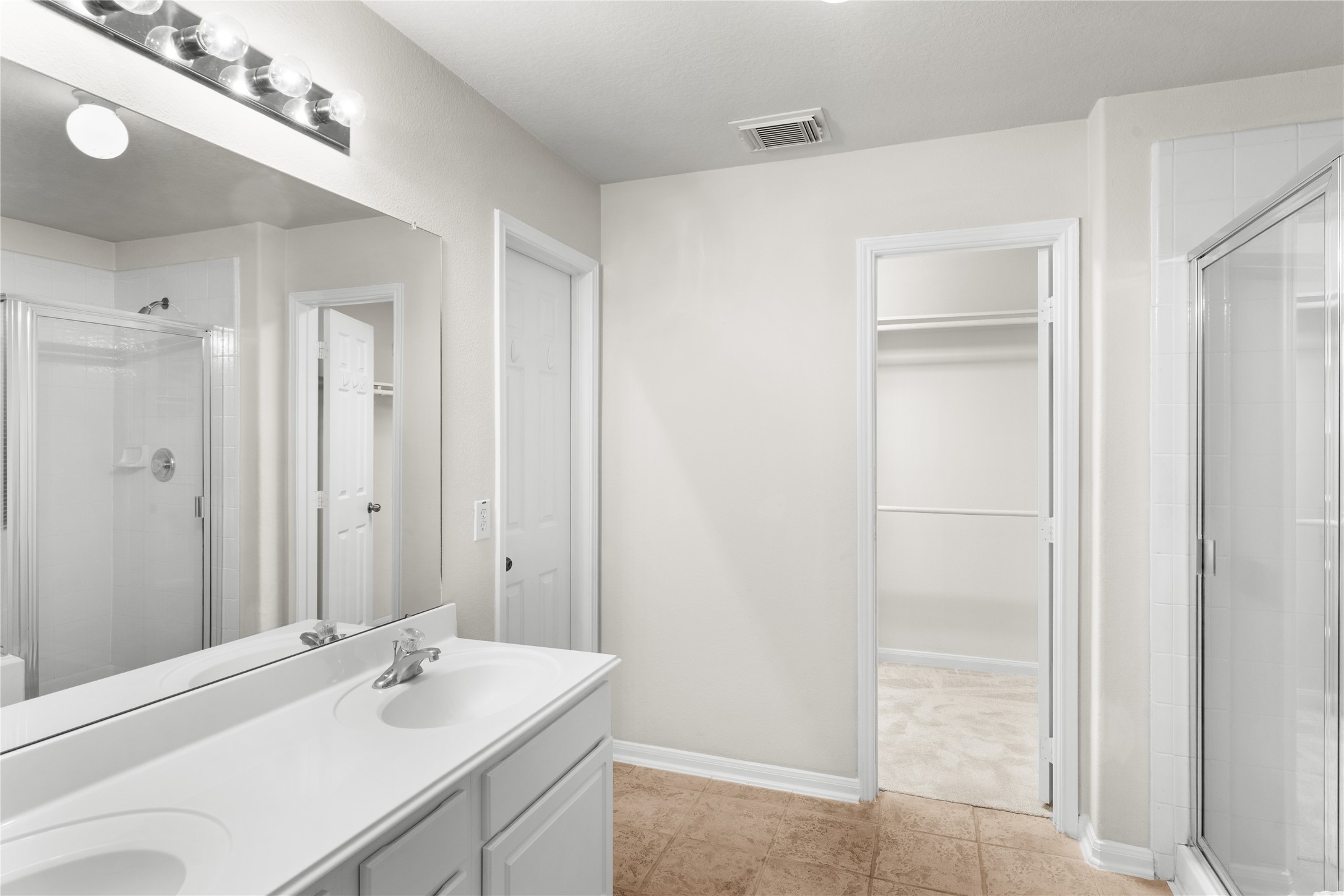 3522 Brackenfern Road Katy, TX 77449 - Photo 18 of 32 a bathroom with a sink and a mirror