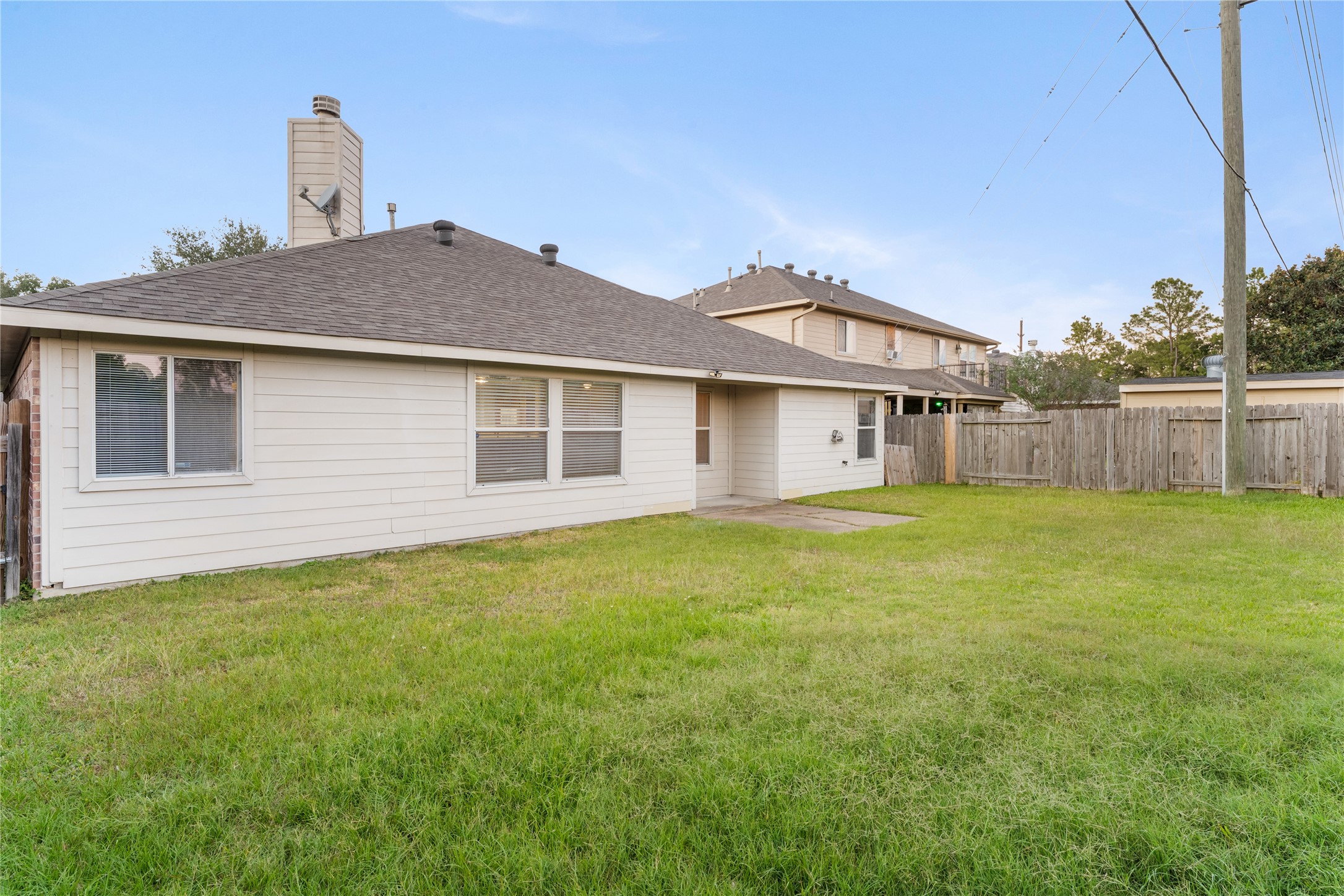 3522 Brackenfern Road Katy, TX 77449 - Photo 32 of 32 a front view of a house with a garden