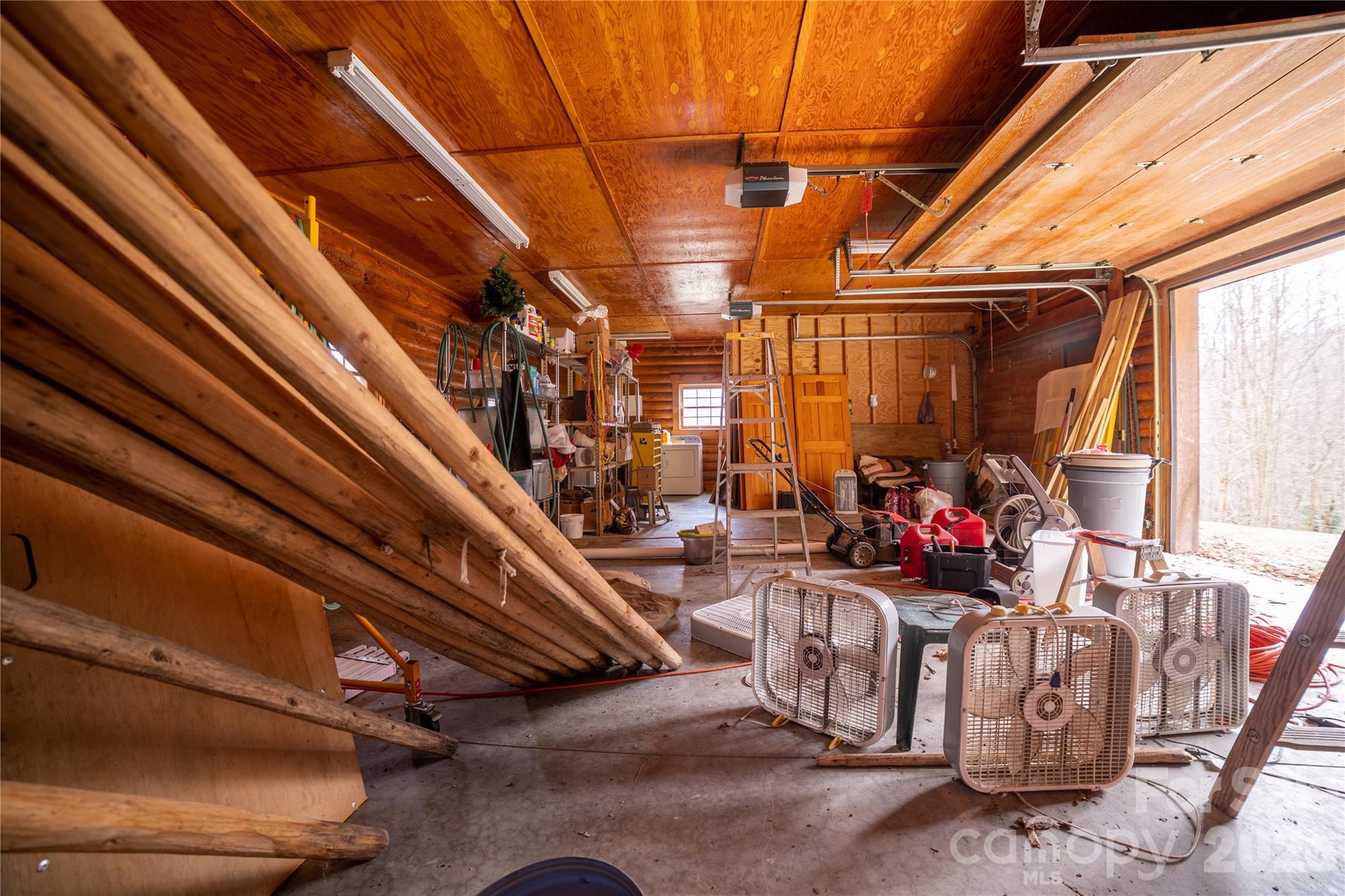 682 Rock House Road Hot Springs, NC 28743 - Photo 29 of 43 a view of a storage room with a couch