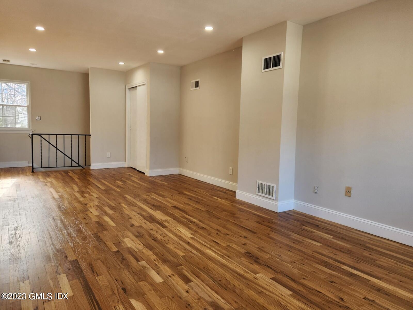 96 Valley Road, Unit 18 Cos Cob, CT 06807 - Photo 11 of 24 a view of a livingroom with wooden floor