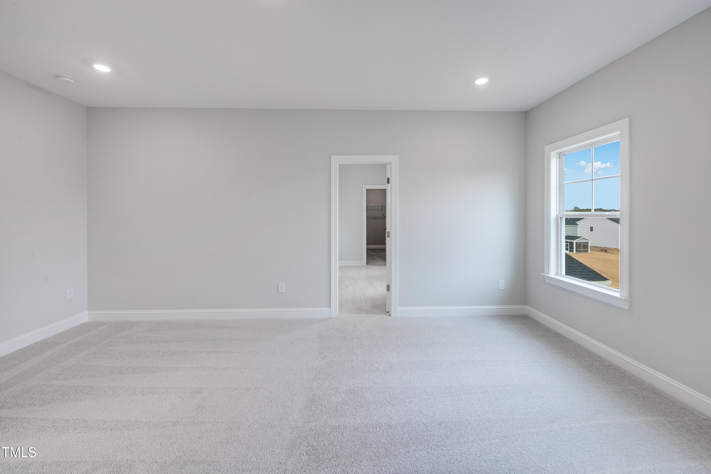 150 East Stanton Street Garner, NC 27529 - Photo 14 of 18 a view of an empty room with a window