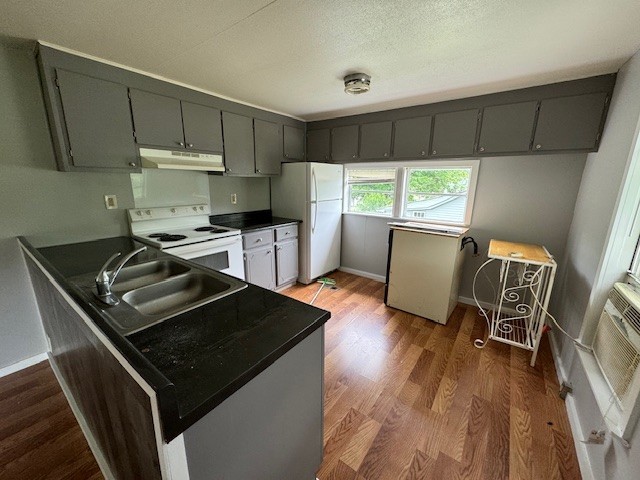 301 Eastbrook Road Estill Springs, TN 37330 - Photo 2 of 7 a kitchen with stainless steel appliances granite countertop a stove and a refrigerator