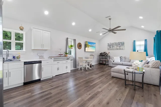 a living room with furniture and window