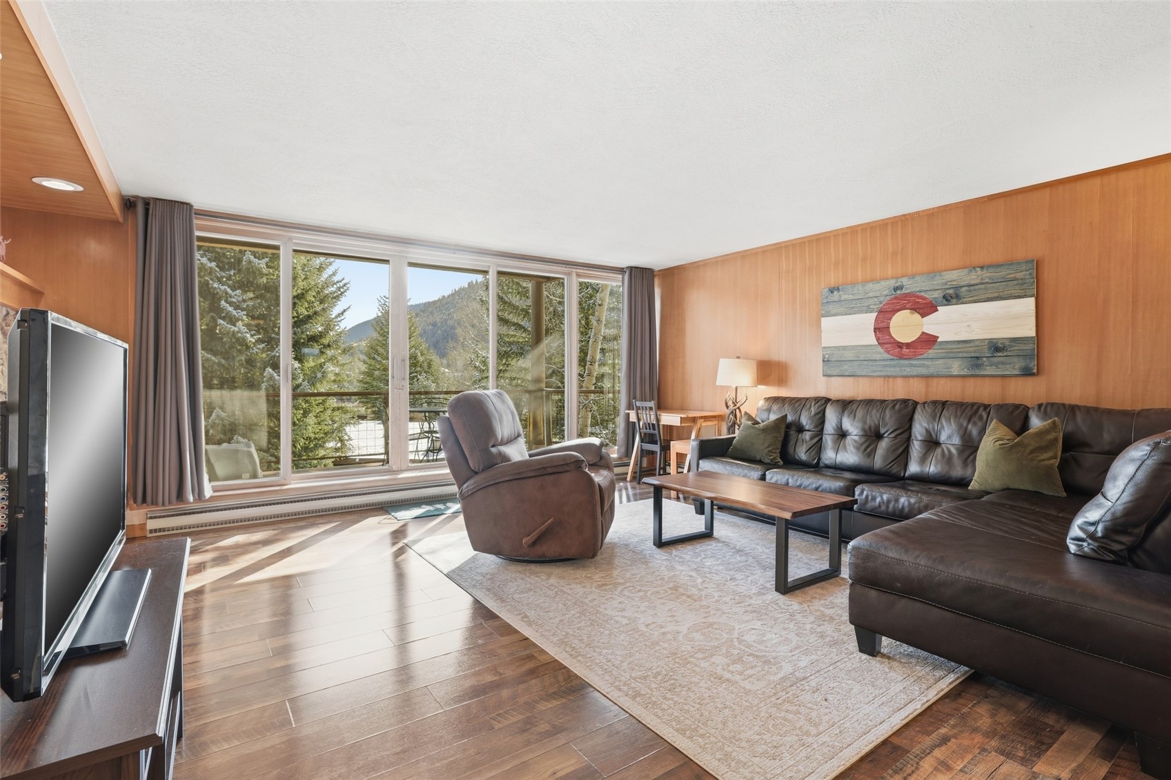 21700 Highway 6, Unit 2015 Keystone, CO 80435 - Photo 11 of 50 a living room with furniture and a large window