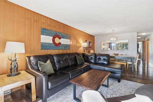 a living room with furniture and a table