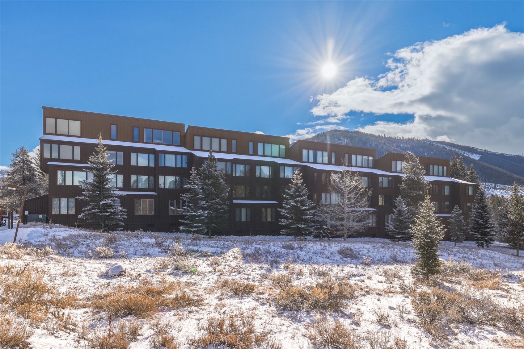 21700 Highway 6, Unit 2015 Keystone, CO 80435 - Photo 3 of 50 a view of building with a yard