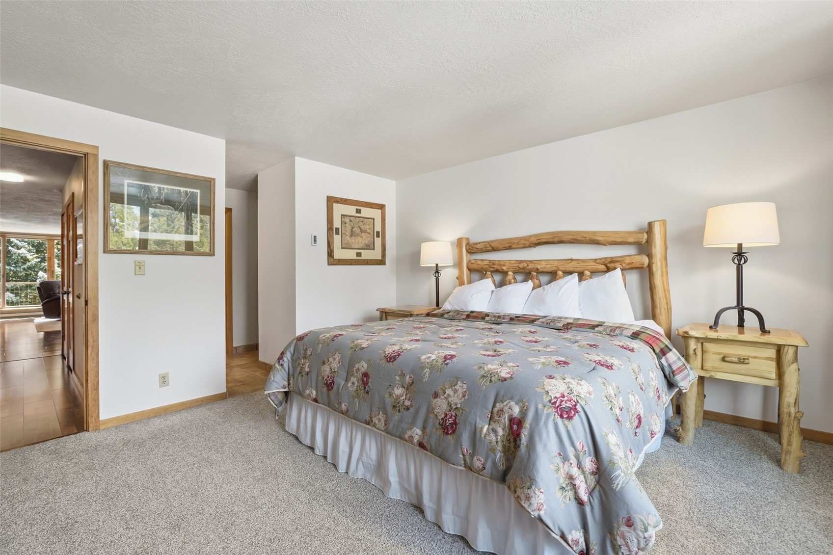 21700 Highway 6, Unit 2015 Keystone, CO 80435 - Photo 34 of 50 a bedroom with a bed and a lamp