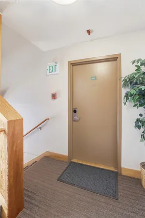 an empty room with wooden floor