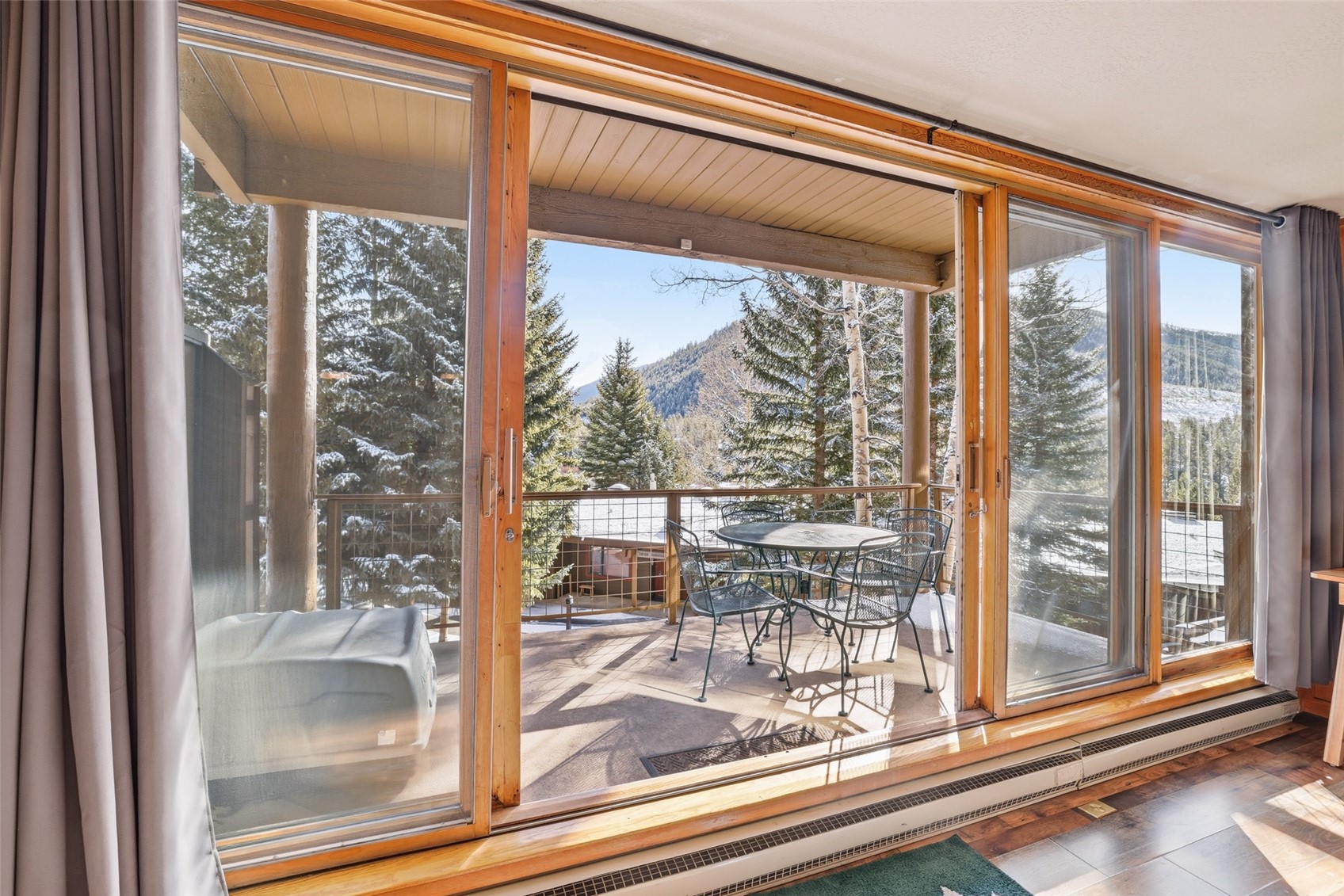 21700 Highway 6, Unit 2015 Keystone, CO 80435 - Photo 10 of 50 a view of a room that has a glass door