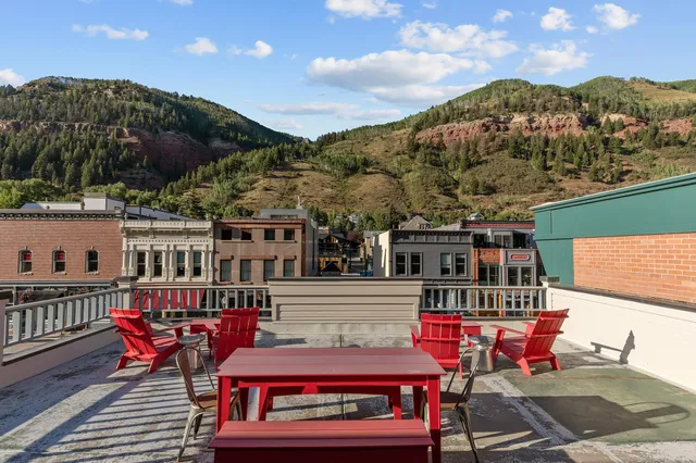 a view of a chairs and table on the terrace