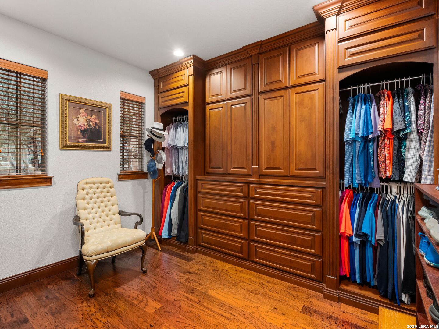 19819 Wild Hollow Garden Ridge, TX 78266 - Photo 32 of 68 a view of room with furniture and clothes